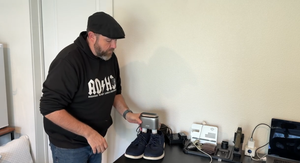 Creator using the SOTHING Ultra Boot Dryer with a pair of shoes